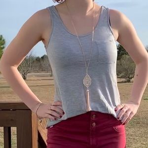 Gray tank top with pocket and chiffon hem